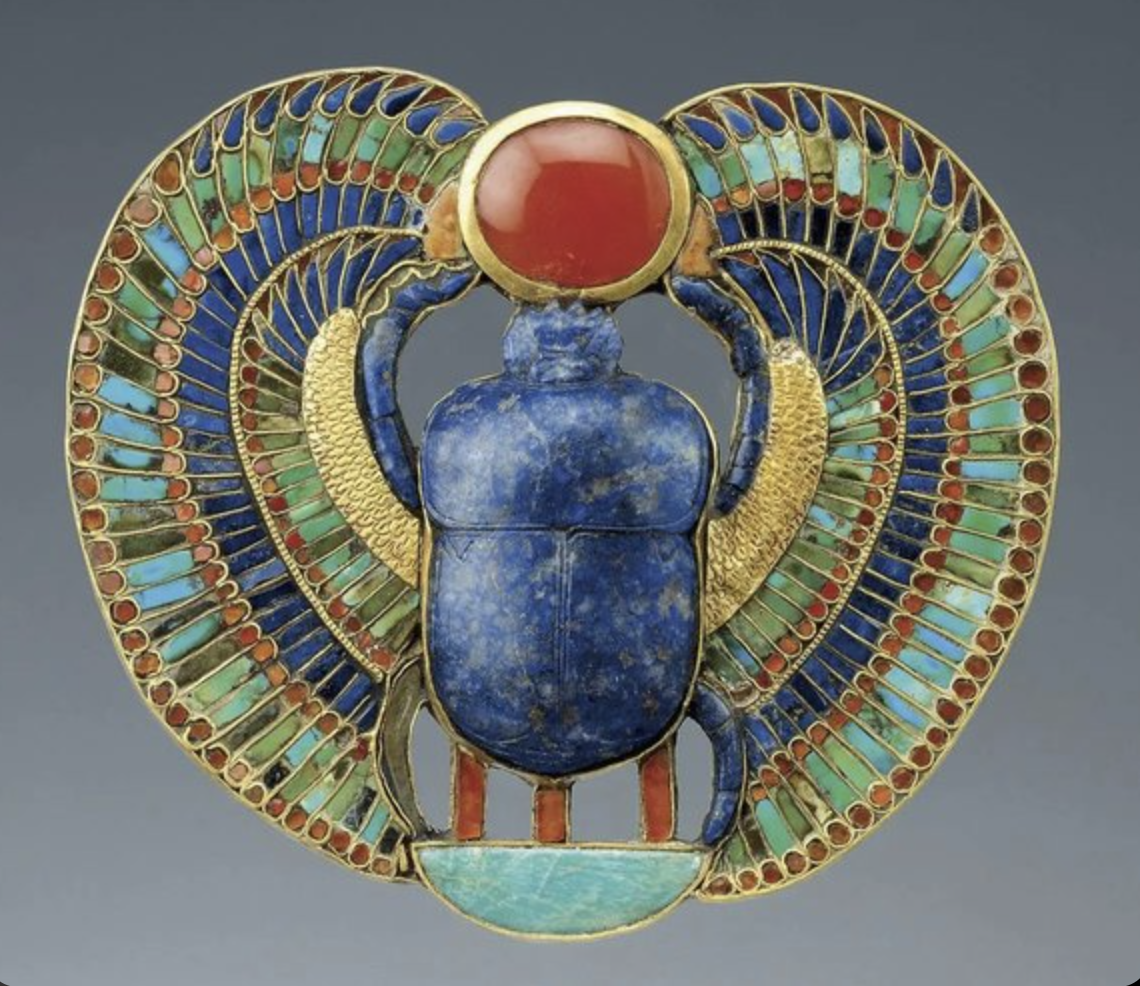 An Egyptian revival scarab brooch in lapis, turquoise and gold