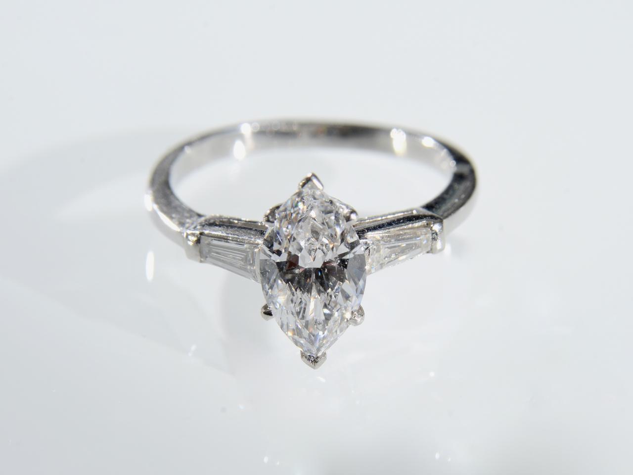 Marquise cut diamond solitaire ring in platinum, centrally set with a 1 ...