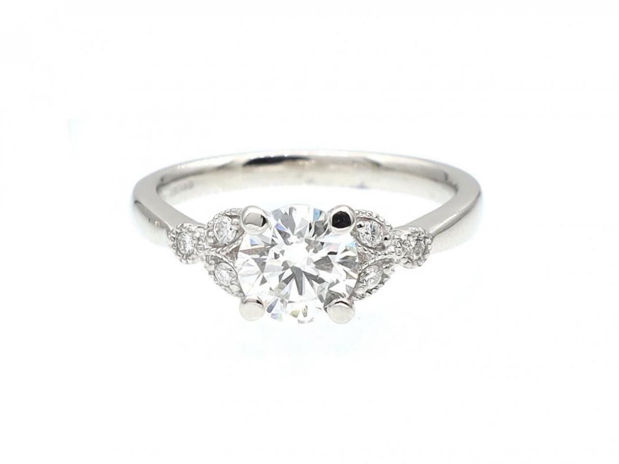 Vintage style 0.90ct diamond solitaire ring with leaf motif shoulders