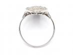 Edwardian oval diamond cluster engagement ring in platinum