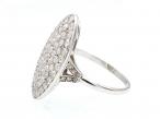 Edwardian oval diamond cluster engagement ring in platinum