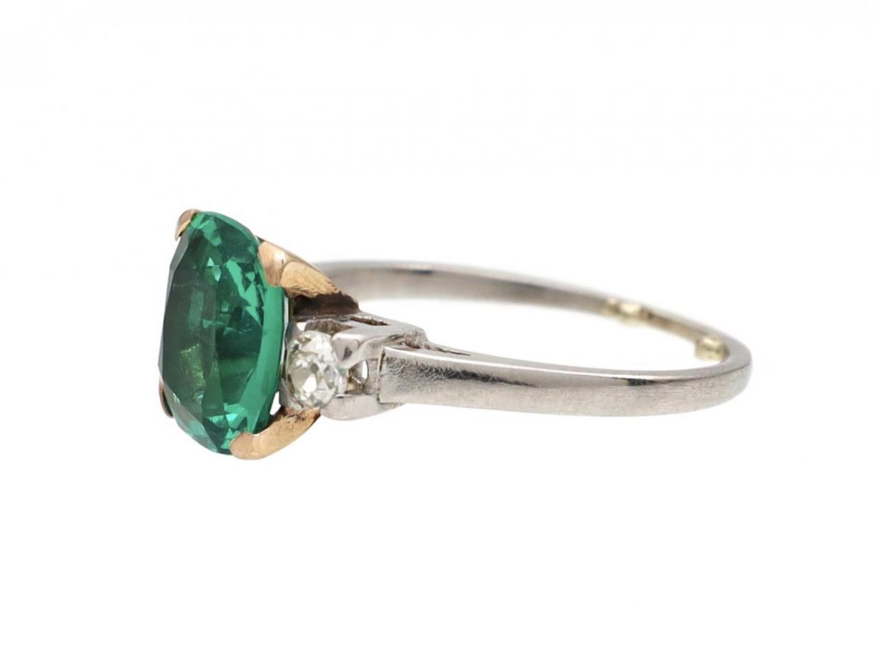 Panjshir emerald and diamond three stone ring in platinum