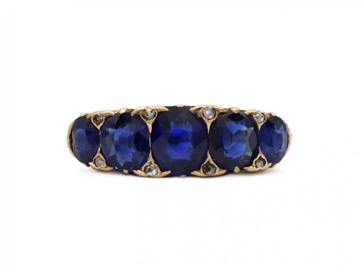Victorian sapphire five stone carved ring in 18kt yellow gold