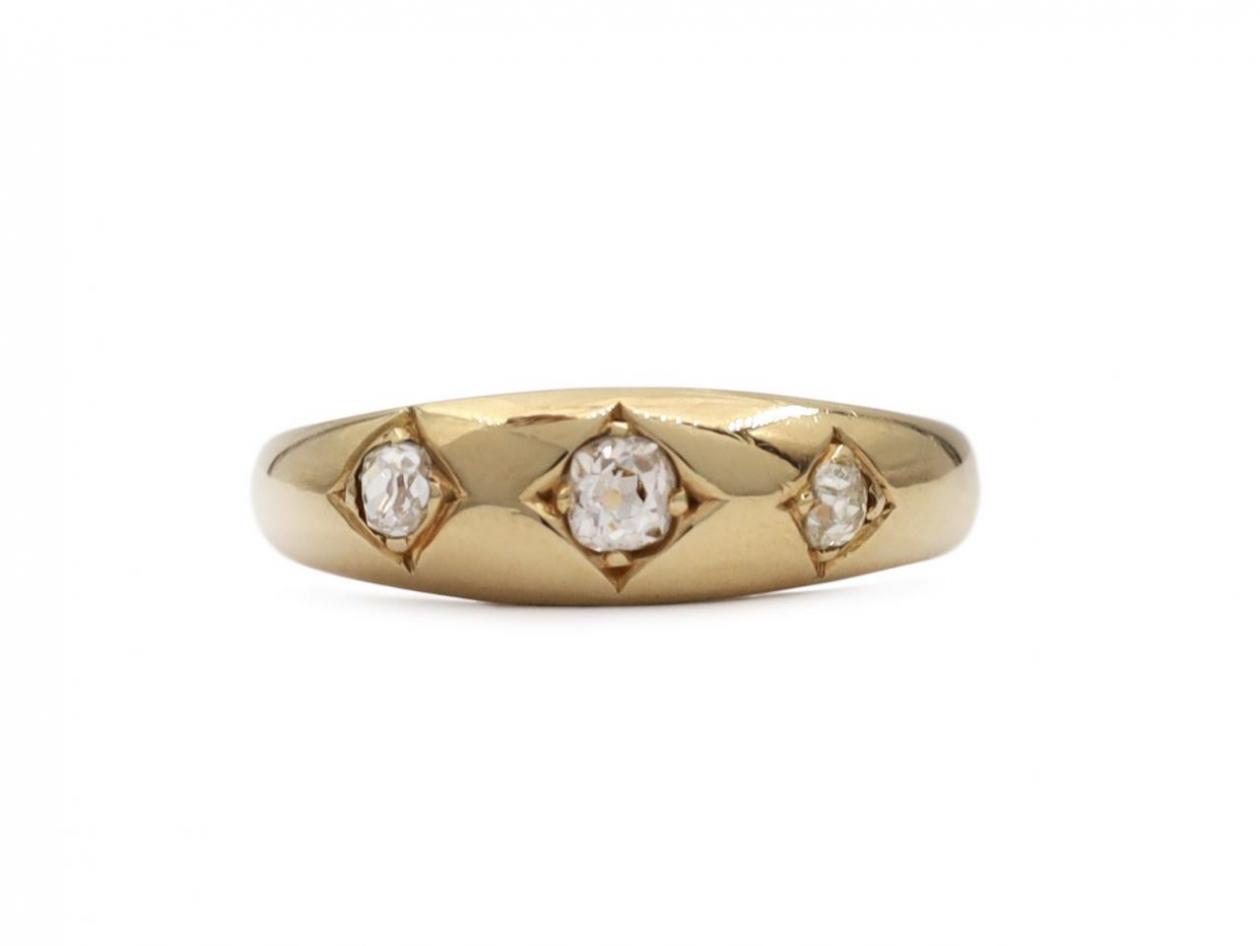 1902 diamond three stone gypsy ring in 18kt yellow gold