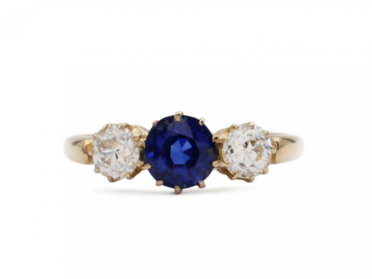 Antique sapphire and diamond three stone engagement ring in gold
