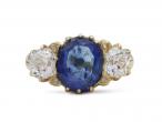 Antique sapphire and diamond graduating three stone engagement ring in gold