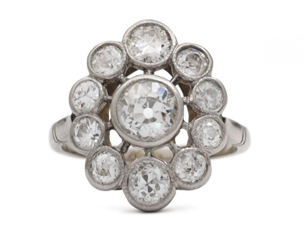 1960s diamond openwork cluster ring in platinum and 18kt white gold