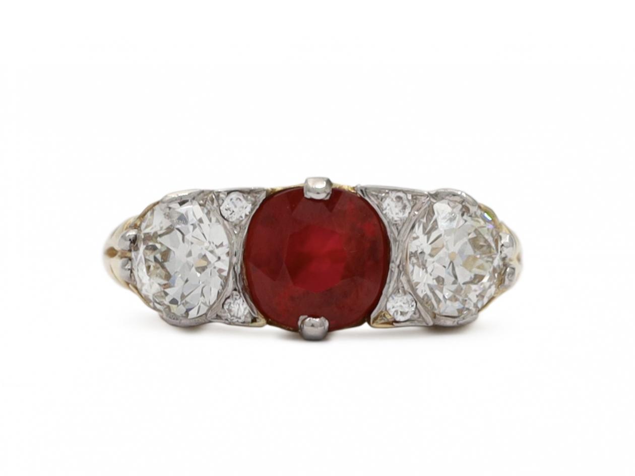 Antique ruby and diamond three stone carved ring