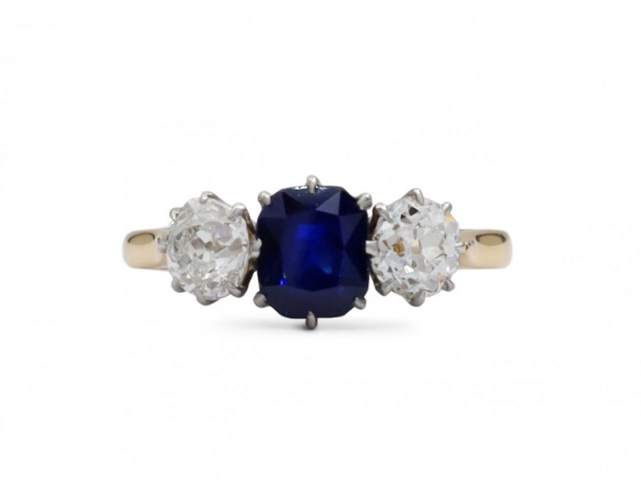 Edwardian cushion cut sapphire and diamond three stone ring