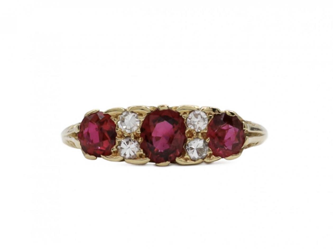 Antique ruby and diamond three stone carved ring