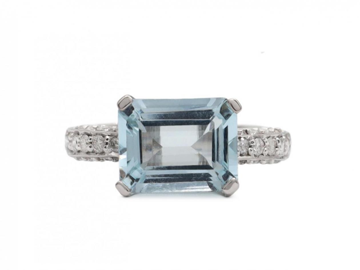 Modern East to West aquamarine and diamond ring