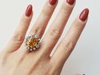Modern 6.52ct fancy yellowish orange sapphire and old cut diamond cluster ring