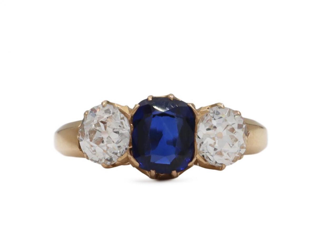 Antique sapphire and diamond three stone engagement ring