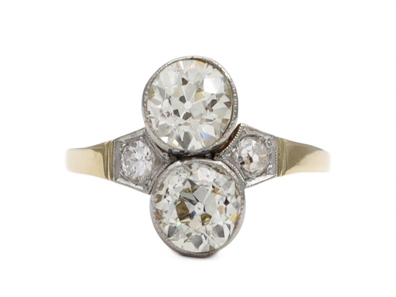 Edwardian vertical diamond 'toi et moi' engagement ring