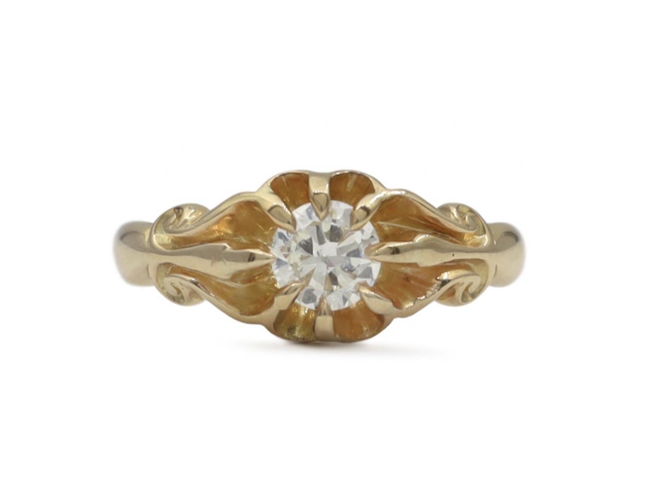 Edwardian diamond solitaire carved engagement ring in gold