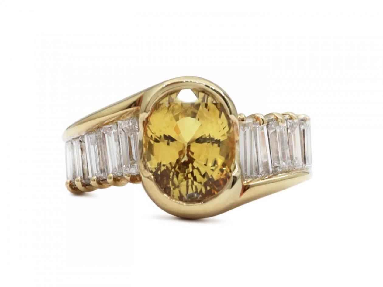 Modern fancy yellow sapphire and diamond wave ring