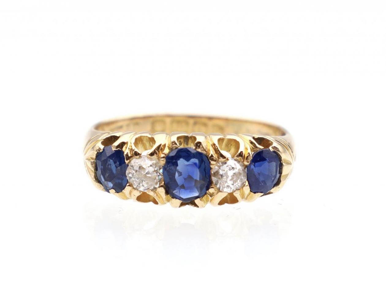 1901 sapphire and diamond five stone ring in 18kt yellow gold